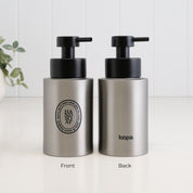 Front and back view of a 250ml brushed 304 stainless steel hand soap dispenser with black oval label, satin black liquid pump and Loopa branding, designed as a refillable soap dispenser for bathroom or kitchen sinks.