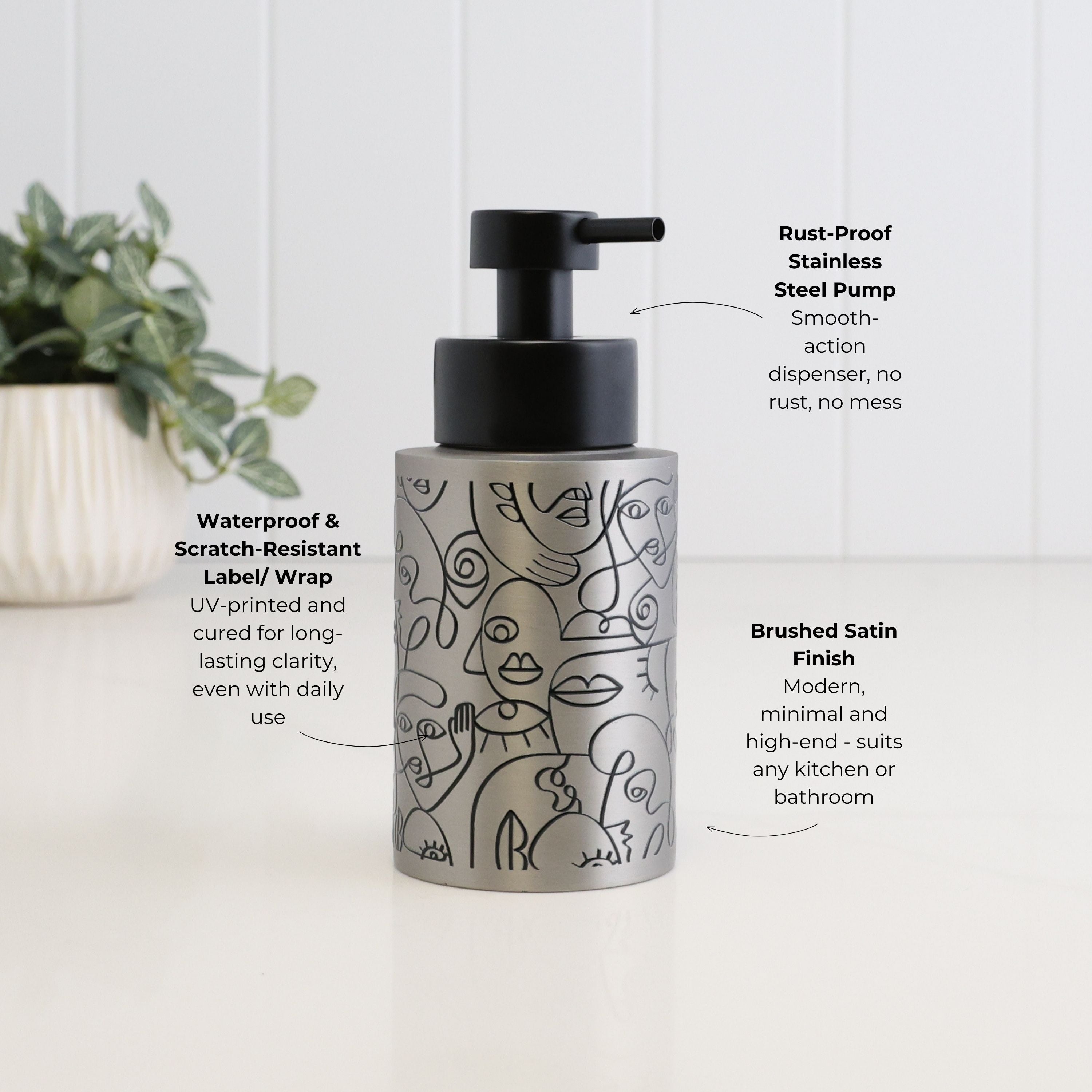 250ml brushed stainless steel soap dispenser with black abstract line art and satin black pump, highlighting its waterproof scratch-resistant wrap, rust-resistant stainless steel pump and modern brushed satin finish.