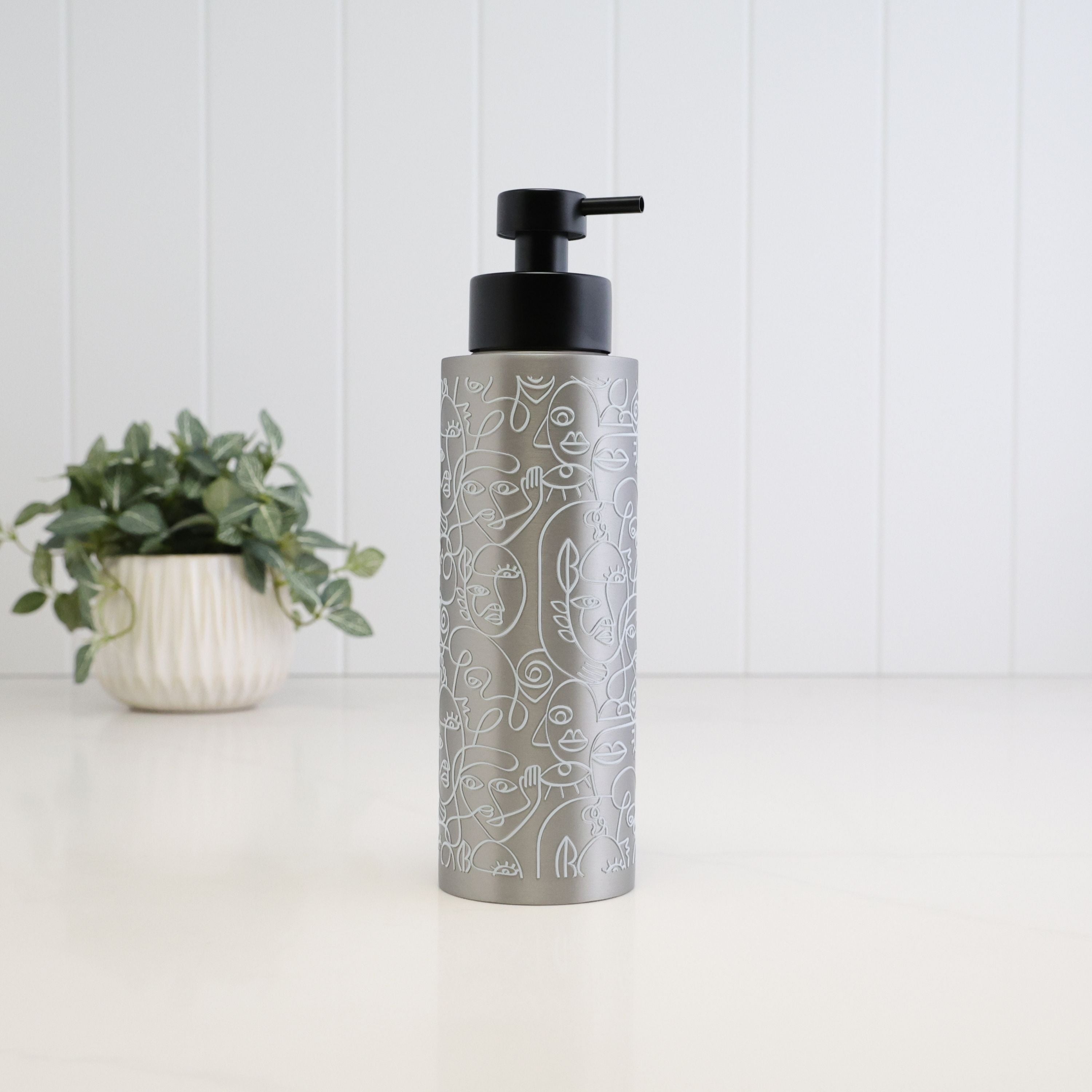 Tall 500ml brushed 304 stainless steel soap dispenser with white abstract line art wrap and satin black pump, designed as a refillable bottle for hand soap, dish soap, shampoo, conditioner or body wash.