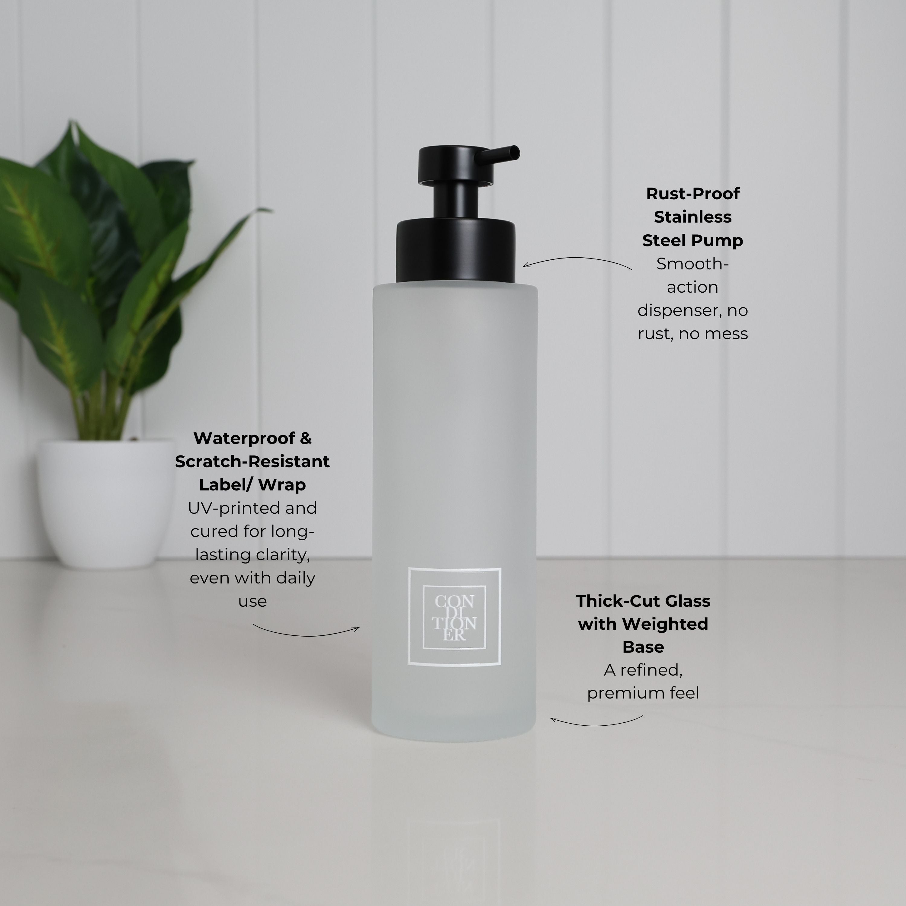 500ml frosted glass soap dispenser with white Conditioner label, satin black stainless steel pump, waterproof scratch-resistant wrap and thick-cut weighted base, designed as a refillable conditioner bottle for bathrooms and showers.