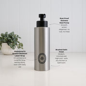 500ml brushed 304 stainless steel shampoo dispenser with black oval label and satin black liquid pump, highlighting the waterproof scratch-resistant UV-DTF label, rust-resistant pump and brushed satin finish.
