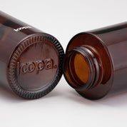 Close up photo Amber Bottle Bottom and Top