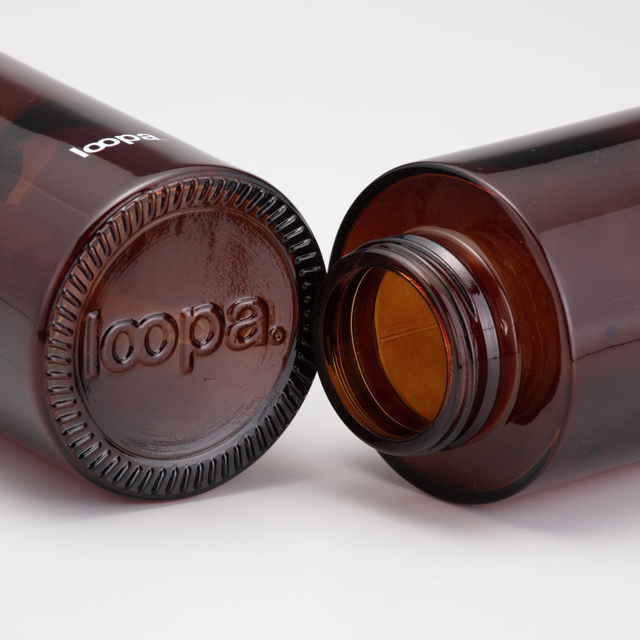 Close up photo Amber Bottle Bottom and Top