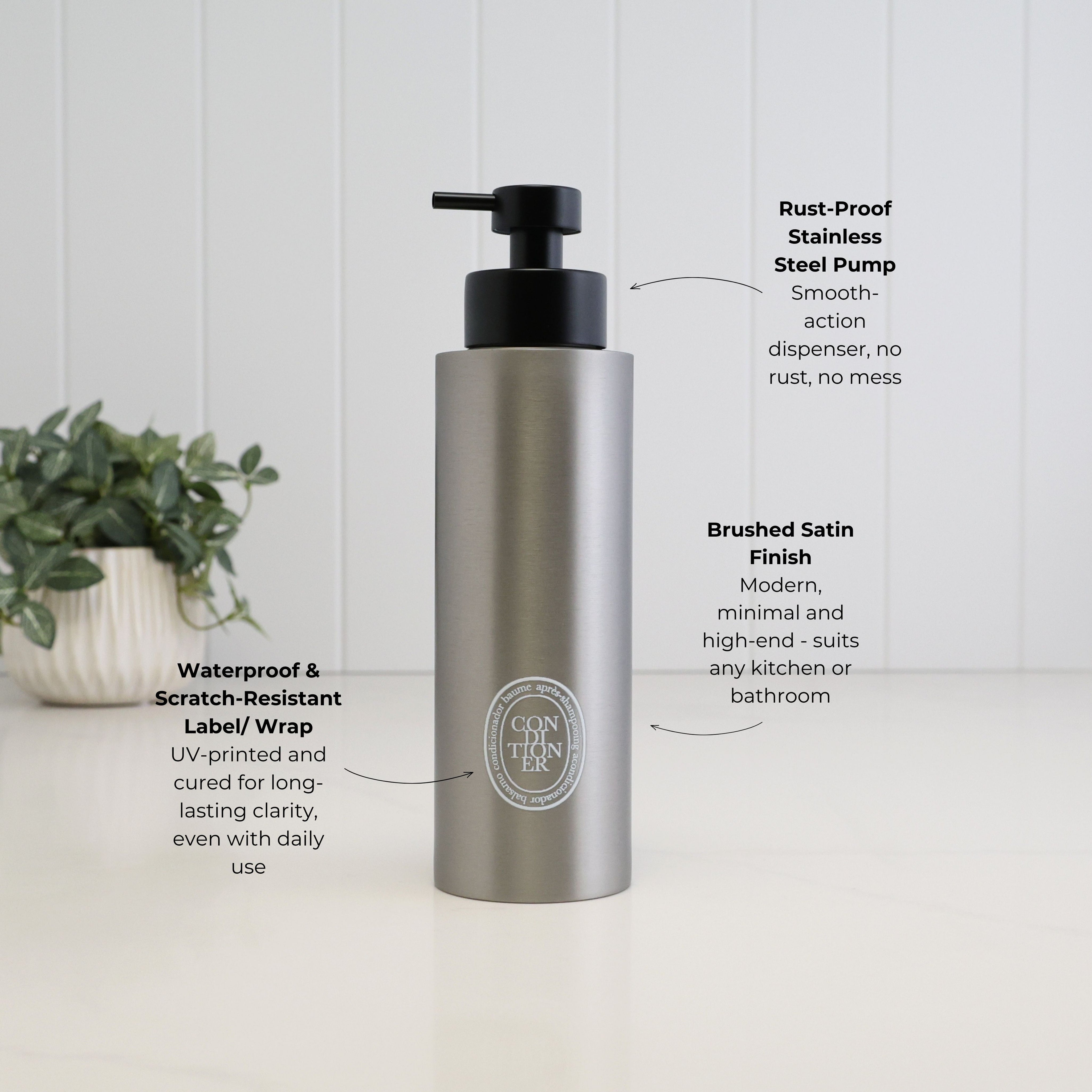 500ml brushed 304 stainless steel conditioner dispenser with white oval UV-DTF label and satin black liquid pump, highlighting its brushed finish, waterproof scratch-resistant label and stainless steel pump.