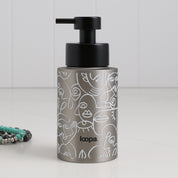 Brushed stainless steel round bottle dispenser with a white wrap label, shown as a 250ml refillable option for soap or lotion