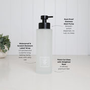 500ml frosted glass conditioner dispenser with white square Conditioner label and satin black stainless steel pump, featuring thick-cut weighted glass and a waterproof scratch-resistant wrap for a premium refillable bathroom bottle.