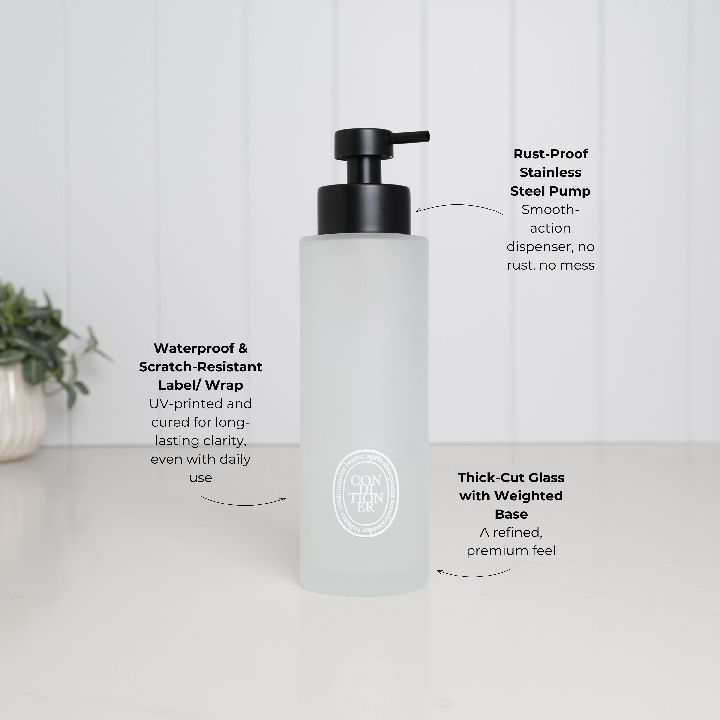 500ml frosted glass conditioner dispenser with white oval label, satin black stainless steel pump, thick-cut weighted base and waterproof scratch-resistant UV-DTF finish.