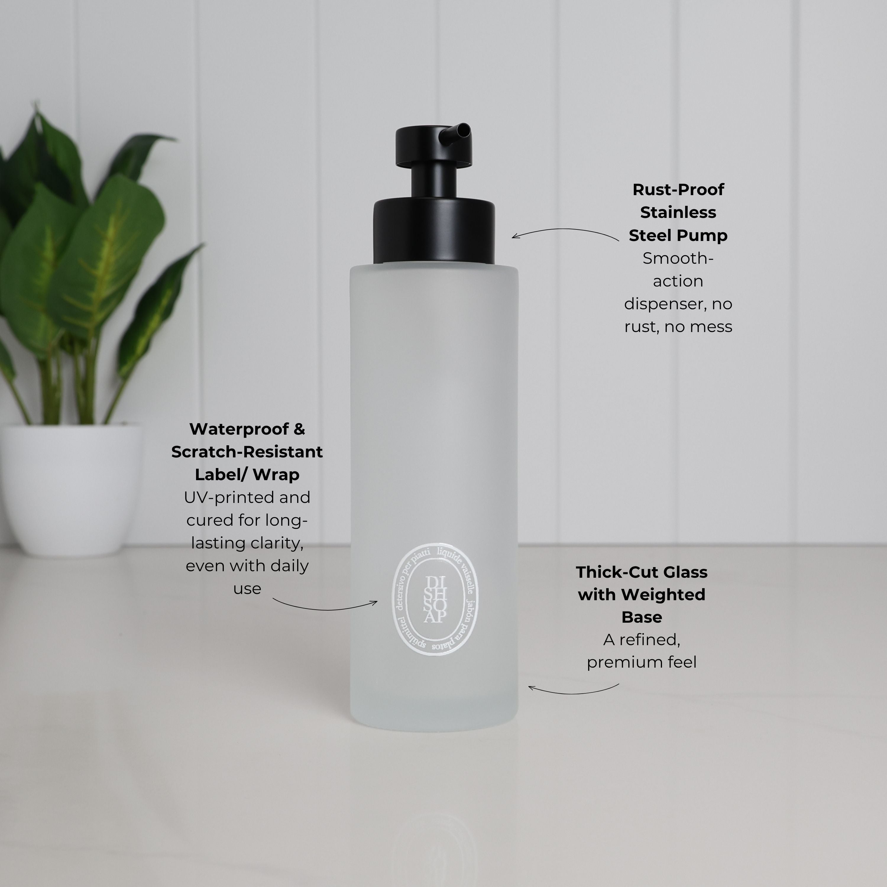 500ml frosted glass dish soap dispenser with white oval label, satin black stainless steel pump, waterproof scratch-resistant UV-DTF print and thick-cut weighted glass base.