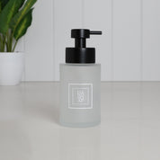 250ml frosted glass hand soap dispenser with white square Hand Soap label and satin black stainless steel pump, designed as a compact refillable soap bottle for bathroom sinks, cloakrooms and ensuites.
