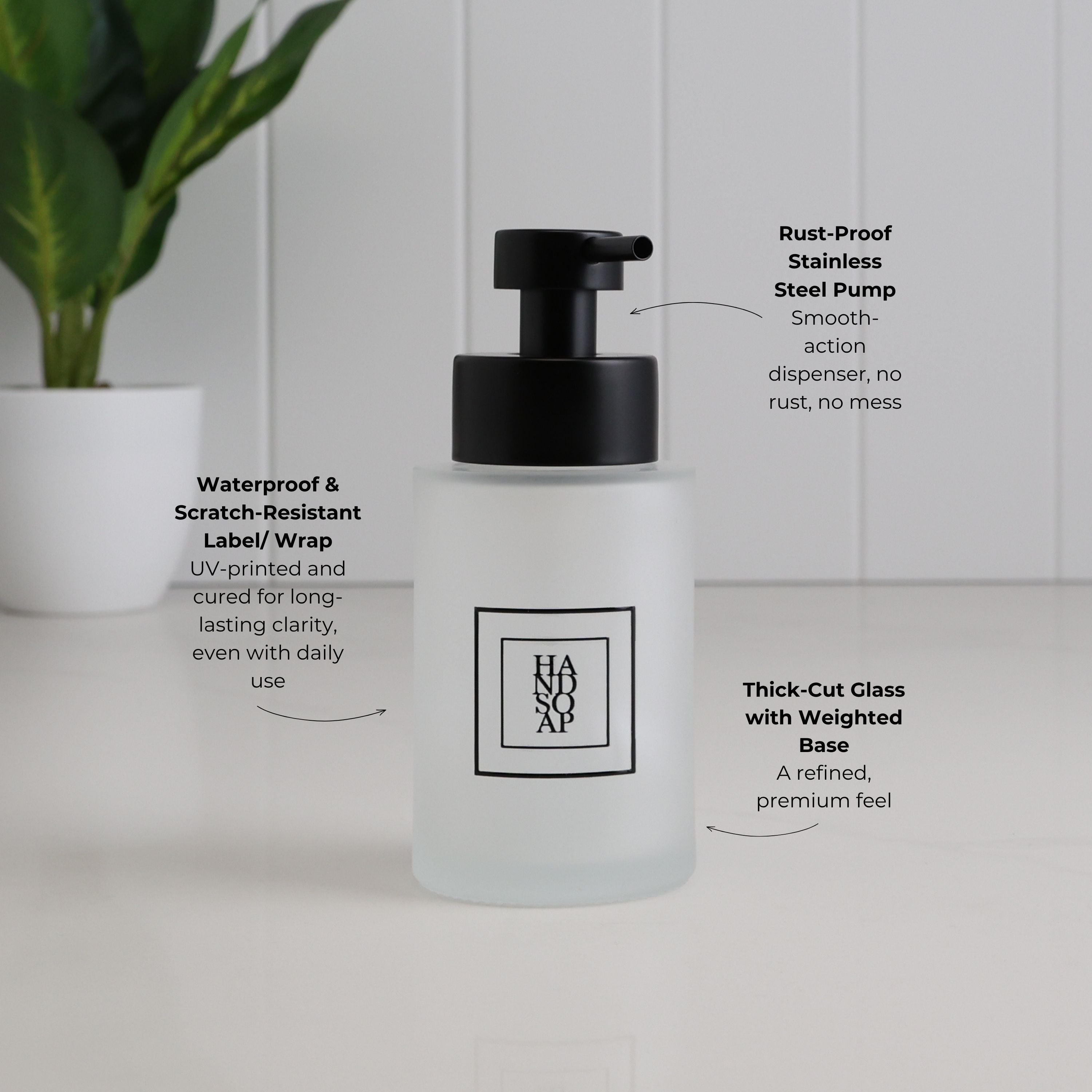 250ml frosted glass hand soap dispenser with black square label, thick-cut weighted base and satin black stainless steel pump, highlighting the waterproof scratch-resistant UV-printed label.