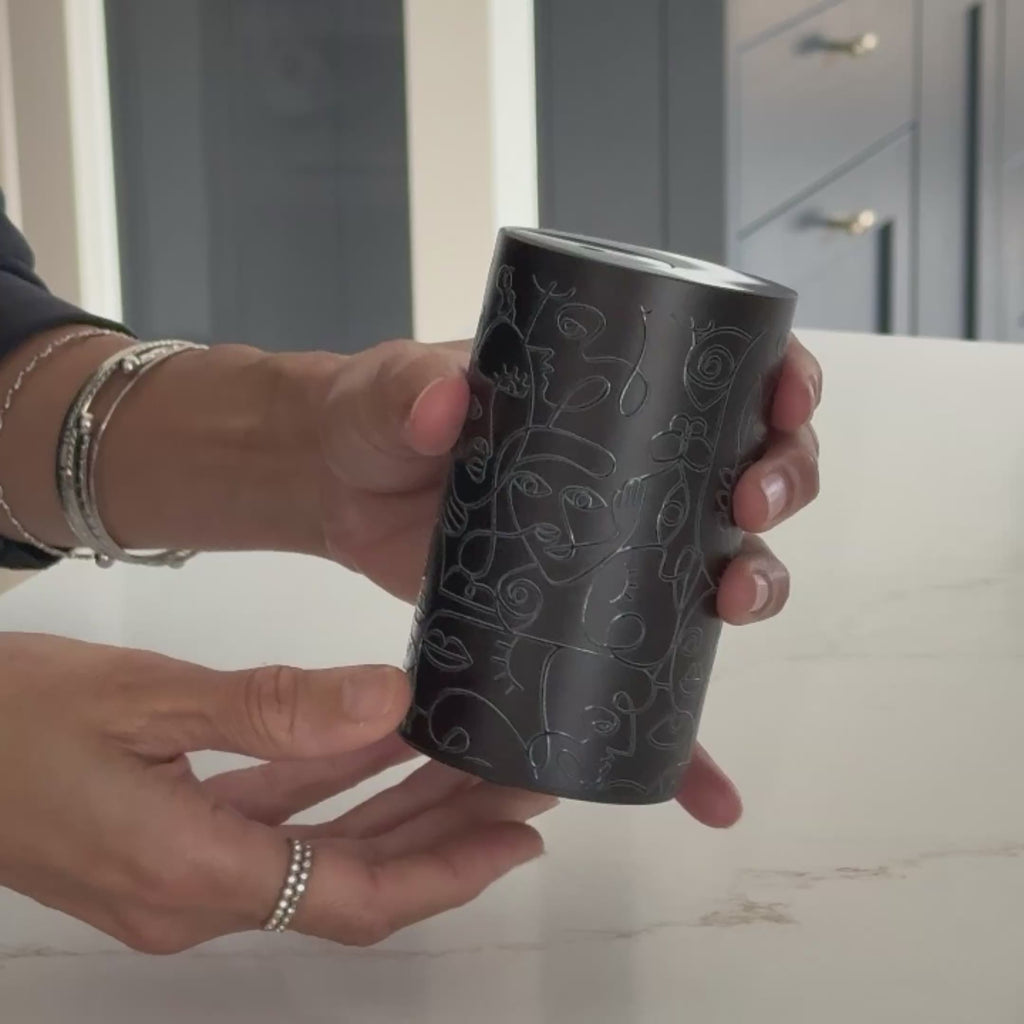 black-waterless-essential-oil-diffuser-abstract-line-art-handheld-product-video
